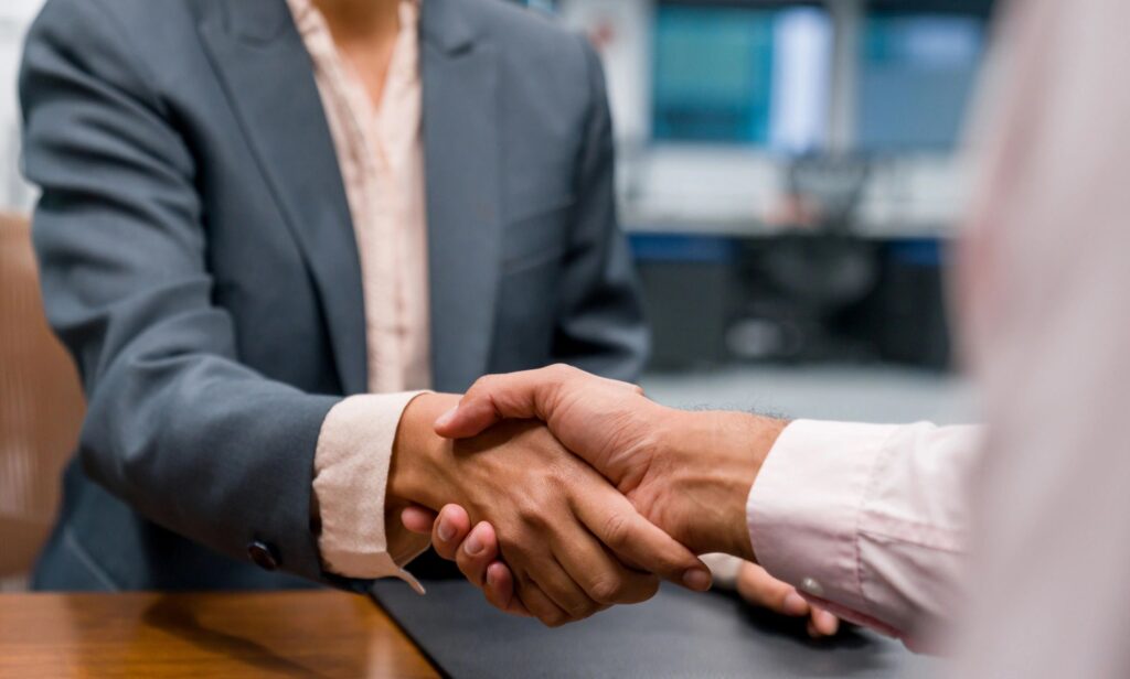 business law mediation handshake